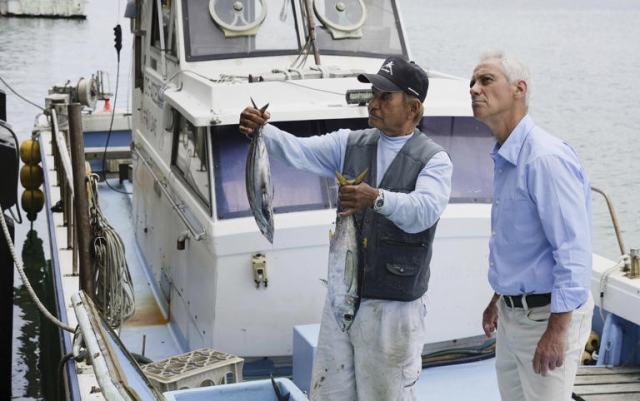 U.S. Ambassador to Japan Rahm Emanuel, right, speaks with a fisherman at a fishing port on Yonaguni Island in Okinawa prefecture, southern Japan Friday, May 17, 2024. Emanuel visited two southwestern Japanese islands at the forefront of tension with China's increasingly assertive actions in the regional waters. (Kyodo News via AP)
© Provided by The Associated Press