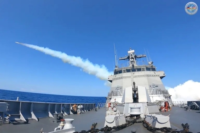 A C-Star surface-to-surface, antiship missile is fired from the BRP Jose Rizal towards a mock enemy during a maritime strike exercise this week [Armed Forces of the Philippines via AFP]