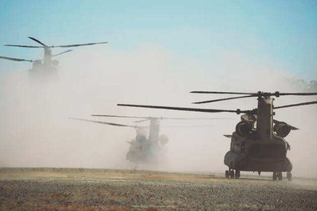US Army helicopters take off in Ilocos Norte province during this week's joint military exercise [Aaron Favila/AP Photo
