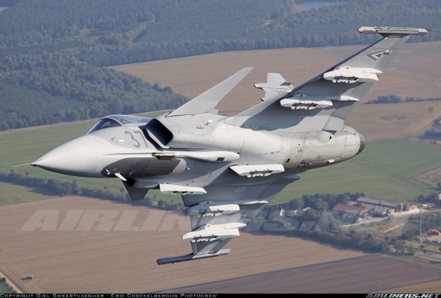 A Saab Gripen multi-role fighter in flight over the Hungarian countryside. 
