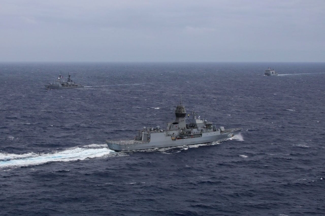  FILE PHOTO. Philippine Navy ships BRP Davao Del Sur (right) and BRP Gregorio Del Pilar (left) conduct a maritime cooperative activity with HMAS Toowoomba during a regional presence deployment. (Photo from the Australian Defence Department)

Australian Defence Department 