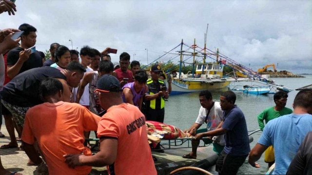 TRAGEDY AT SEA. The surviving crew members of the fishing boat Dearyn arrive at Barangay Cato, Infanta, Pangasinan, on October 2, 2023, after its mother ship was rammed by an unidentified commercial vessel transiting the vicinity waters off Bajo de Masinloc, according to the Philippine Coast Guard.

Photo courtesy of the Philippine Coast Guard 