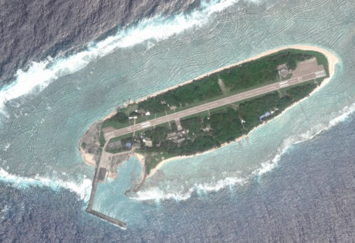 Taiping Island, also known as Itu Aba,[note 1] and various other names, is the largest of the naturally occurring Spratly Islands in the South China Sea.[3][4][5][6][note 2] The island is elliptical in shape being 1.4 kilometres (0.87 mi) in length and 0.4 kilometres (0.25 mi) in width, with an area of 46 hectares (110 acres). It is located on the northern edge of the Tizard Bank (Zheng He Reefs; 鄭和群礁). The runway of the Taiping Island Airport is easily the most prominent feature on the island, running its entire length.
