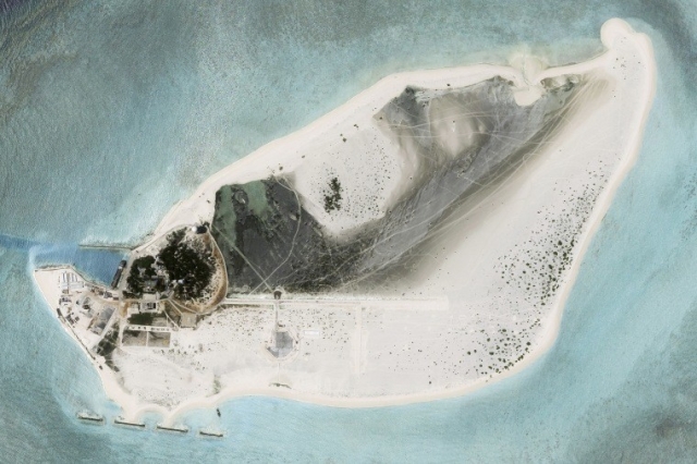 This satellite photo from Aug. 15 reveals development on Triton Island in the South China Sea. Planet Labs PBC / AP
