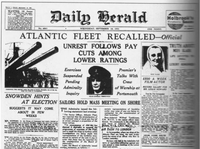 Daily Herald front-page about the mutiny, with photo of navy ship's guns. Reads: Atlantic Fleet Recalled. Unrest follows pay cuts among lower ratings. Exercises suspended pending admiralty inquiry.
