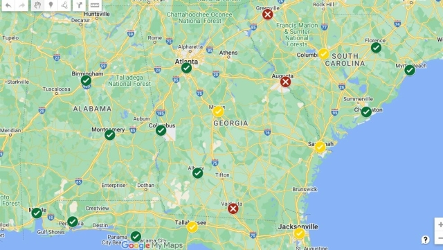 A map of the southeast portion of the United States showing numerous cities with green, yellow, red check marks on them.