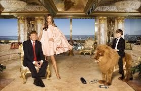 Just your typical family photo. Golden room, wife in flowing gown, and son riding a stuffed lion.