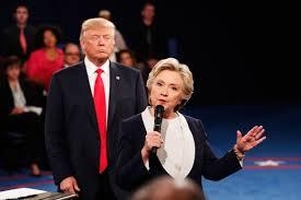 Donald Trump stalking Hillary Clinton on the debate stage in 2016.