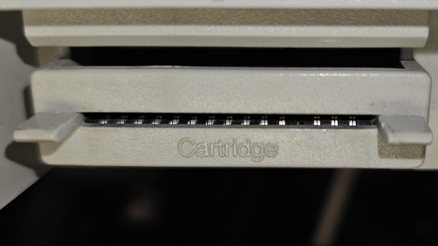 Cartridge port on an Atari 65XE computer. It looks like there's a bent or missing pin. 