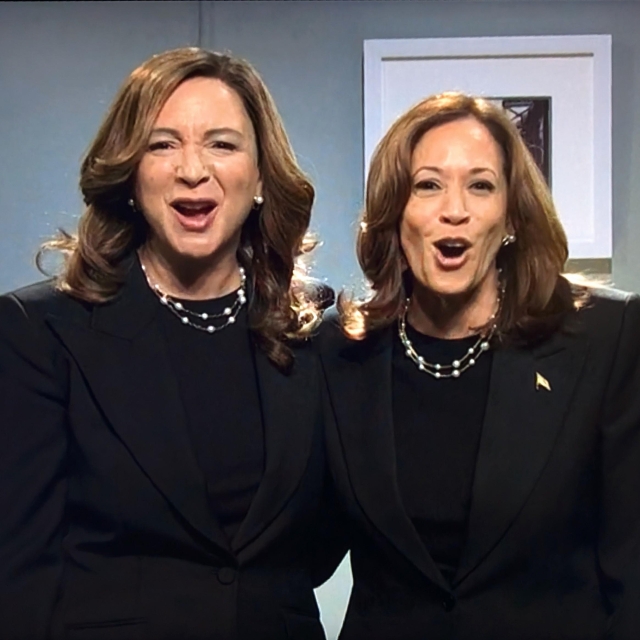 Photo of a TV screen showing Maya Rudolph as Kamala Harris and Kamala Harris as... Kamala Harris... saying, "Live from New York it's Saturday Night!"