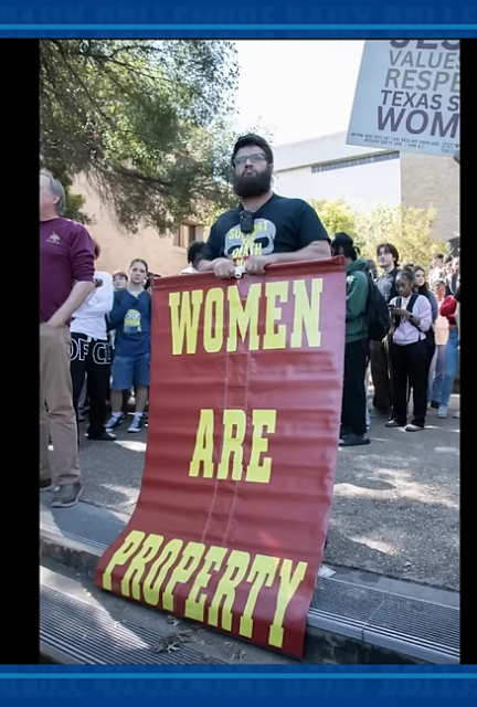 Christofascist at Texas State U holding a sign reading: Women are property. November, 2024