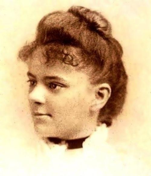 Elizabeth Blackwell as a young woman. She is white, with dark hair in a bun. 