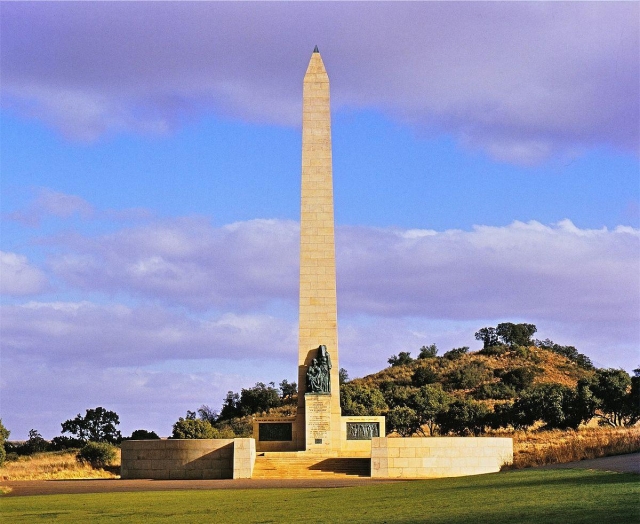 The National Women's Monument at Bloemfontein. It's a tall stone needle with a bronze statue at its base.