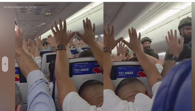 Passengers with their hands up, then a SWAT team coming down the aisle