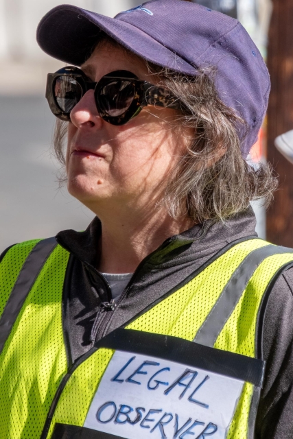 Me, yesterday in a bright yellow vest, prominently labeled LEGAL OBSERVER.